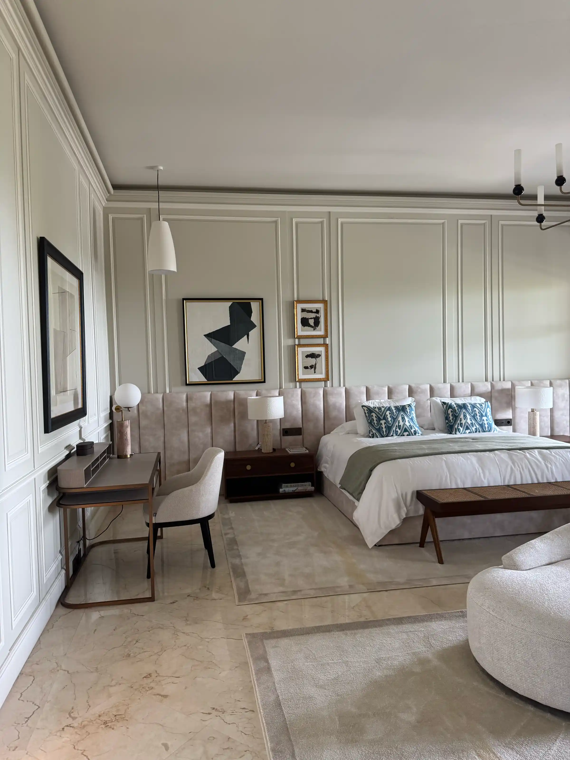 Bedroom with panelled walls in a Marbella villa renovated by Realta